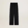 Pantaloni de jogging negri pentru femei, cu stele albe pe laterale