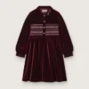 Rochie pentru fete în nuanța burgund, cu efect de catifea și broderie pe partea din față