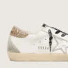 Adidași Super-Star din piele albă pentru femei, cu bandă strălucitoare pe călcâi