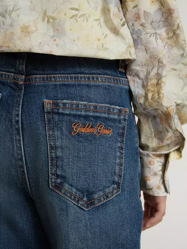 Blugi pentru fete cu croială bootcut, spălare medie și broderie