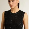 Bluză din tricot negru cu plasă, cu paiete și detalii contrastante