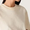 Cămășă unisex „Star” din bumbac alb, cu cristale în degrade pe toată suprafața și imprimeu pe spate