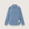 Cămașă unisex Journey din bumbac chambray albastru deschis, cu tiv cu franjuri și aplică brodată