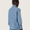 Cămașă unisex Journey din bumbac chambray albastru deschis, cu tiv cu franjuri și aplică brodată