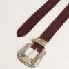 Curea pentru femei din piele de culoare burgund, cu cataramă decorată argintie