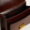 Geanta Venezia din piele laminată maro închis cu detalii aurii