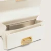 Geanta Venezia mică din piele cu nervuri de culoarea untului, cu detalii aurii