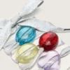 Șireturi argintii „Piele” cu patru pandantive colorate