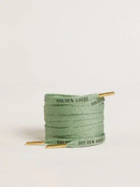 Șireturi din lurex verde-apă cu logo negru contrastant