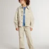 Jachetă bej pentru copii cu pete multicolore