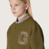 Jachetă bomber unisex Journey din sargă de nailon verde militar cu patch brodat