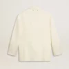 Jachetă oversize cu un singur rând de nasturi, de culoare albă, cu efect de mătase și broderii