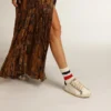 Model Super-Star pentru femei, cu stea perforată și bandă albastru închis pe călcâi