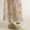 Modelul Marathon pentru femei, cu parte superioară din nailon albastru deschis și stea albastră pastel