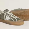 Modelul Super-Star LTD pentru femei, din pânză verde cu stea din piele albă