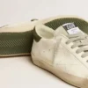 Modelul Super-Star pentru bărbați, pe bază de materiale biologice, cu stea perforată și bandă verde pe călcâi