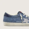 Modelul Super-Star pentru femei din piele de căprioară albastru denim cu stea argintie sclipitoare
