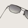 Ochelari de soare în stil aviator, cu ramă de culoare metalică și lentile gri