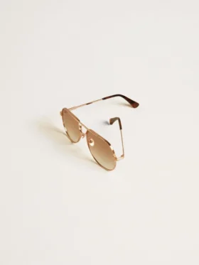 Ochelari de soare în stil aviator, cu ramă din aur roz și lentile de culoarea mierii