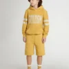Șorturi de jogging pentru copii, de culoare galben ocru, cu broderie