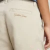 Pantaloni chino bej pentru copii cu pete multicolore