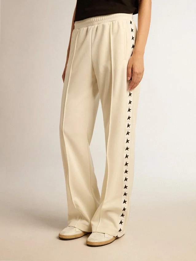Pantaloni de jogging albi pentru femei, cu stele pe laterale
