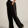 Pantaloni de jogging negri pentru femei, cu stele albe pe laterale