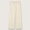 Pantaloni de trening unisex din bumbac și in cu dungi în nuanțe de ecru și nisip