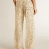 Pantaloni din dantelă transparentă de culoare crem pentru femei