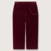 Pantaloni pentru fete de culoare burgund cu efect de catifea și buzunar în spate