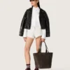 Cămașă oversized pentru femei din bumbac alb, cu detalii plisate și nasturi prețioși