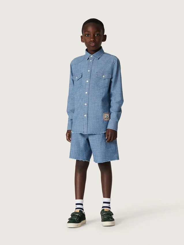 Pantaloni scurți unisex Journey din bumbac chambray albastru deschis, cu logo brodat