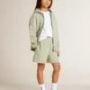 Pantaloni scurți verde deschis cu stea albă