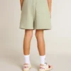 Pantaloni scurți verde deschis cu stea albă