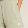 Pantaloni scurți verde deschis cu stea albă