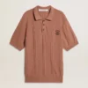 Polo pentru bărbați de culoare cărămizie, cu logo brodat.