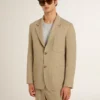 Sacou bărbătesc bej cu dungi fine, cu un singur rând de nasturi și croială oversized