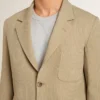 Sacou bărbătesc bej cu dungi fine, cu un singur rând de nasturi și croială oversized