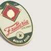 Set de două insigne „Frutteria Golden”