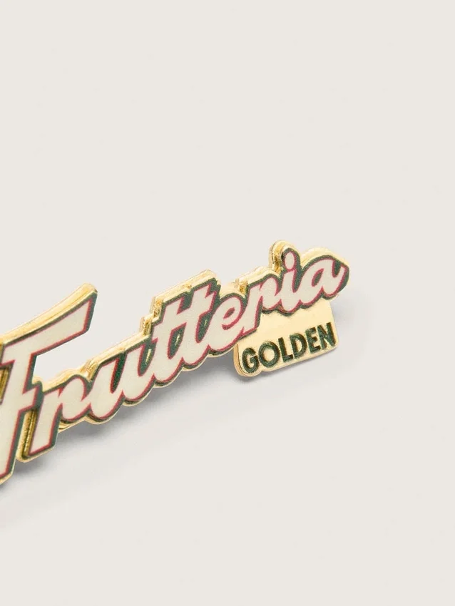 Set de două insigne „Frutteria Golden”