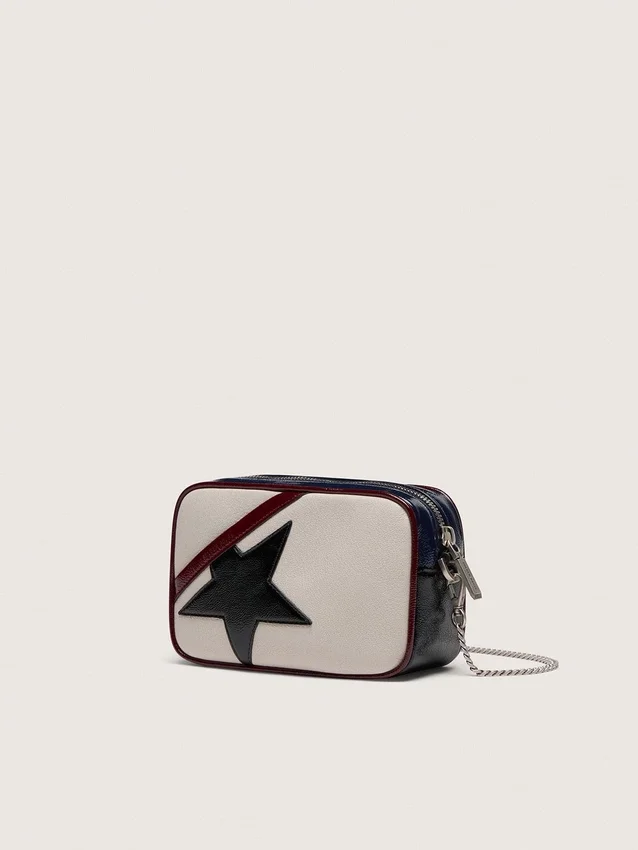 Star Bag mini din piele alb-unt, cu stea neagră și detalii în nuanțe de burgund și albastru închis
