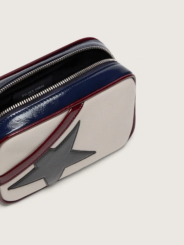 Star Bag mini din piele alb-unt, cu stea neagră și detalii în nuanțe de burgund și albastru închis