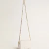 Star Bag mini din piele alb-unt cu stea ton pe ton