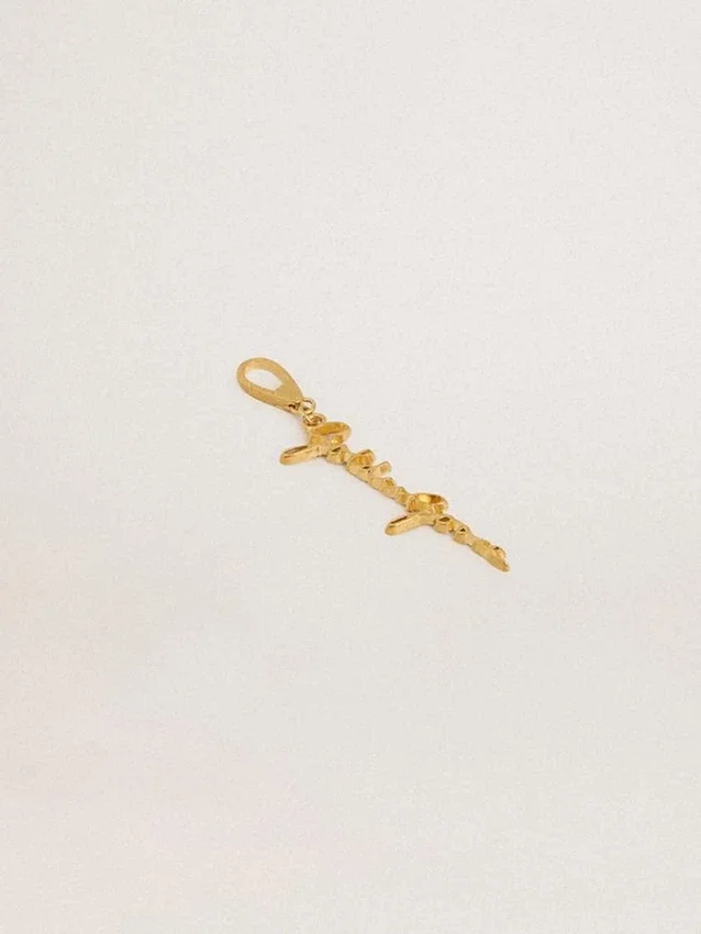 Talisman din alamă de culoare aurie cu semnătura golden goose