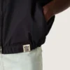 Vestă pentru bărbați din twill de bumbac albastru închis, cu fermoar și etichetă cu imprimeu de steag
